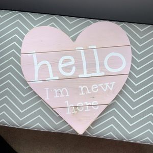 “Hello I’m New Here” wooden Heart shaped Sign
